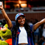 Simone Biles’ Coach Takes Subtle Swipe at Olympics Judges After Gymnast’s First Pitch for Astros