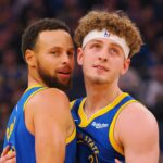 Stephen Curry and Brandin Podziemski