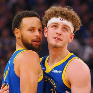 Stephen Curry and Brandin Podziemski