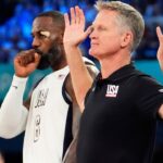 United States head coach Steve Kerr reacts alongside guard LeBron James (6) during the first half against Serbia in a men's basketball semifinal game during the Paris 2024 Olympic Summer Games at Accor Arena.