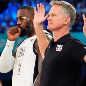 United States head coach Steve Kerr reacts alongside guard LeBron James (6) during the first half against Serbia in a men's basketball semifinal game during the Paris 2024 Olympic Summer Games at Accor Arena.