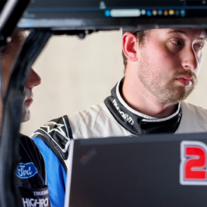 NASCAR Cup Series driver Chase Briscoe (14) stands in his garage Friday, July 19, 2024, during practice for the Brickyard 400 at Indianapolis Motor Speedway. © Bob Goshert/For IndyStar / USA TODAY NETWORK