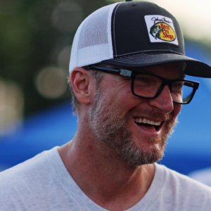Jul 20, 2024; Hampton, VA, USA; Dale Earnhardt Jr. talks with former NASCAR driver Elliot Sadler before the 16th Annual Hampton Heat at Langley Speedway. Mandatory Credit: Peter Casey-Imagn Images