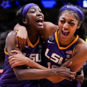 LSU Lady Tigers guard Flau'jae Johnson, left, celebrates with forward Angel Reese after defeating the Virginia Tech Hokies in semifinals of the women's Final Four of the 2023 NCAA Tournament at American Airlines Center. Mandatory Credit: Kirby Lee-Imagn Images
