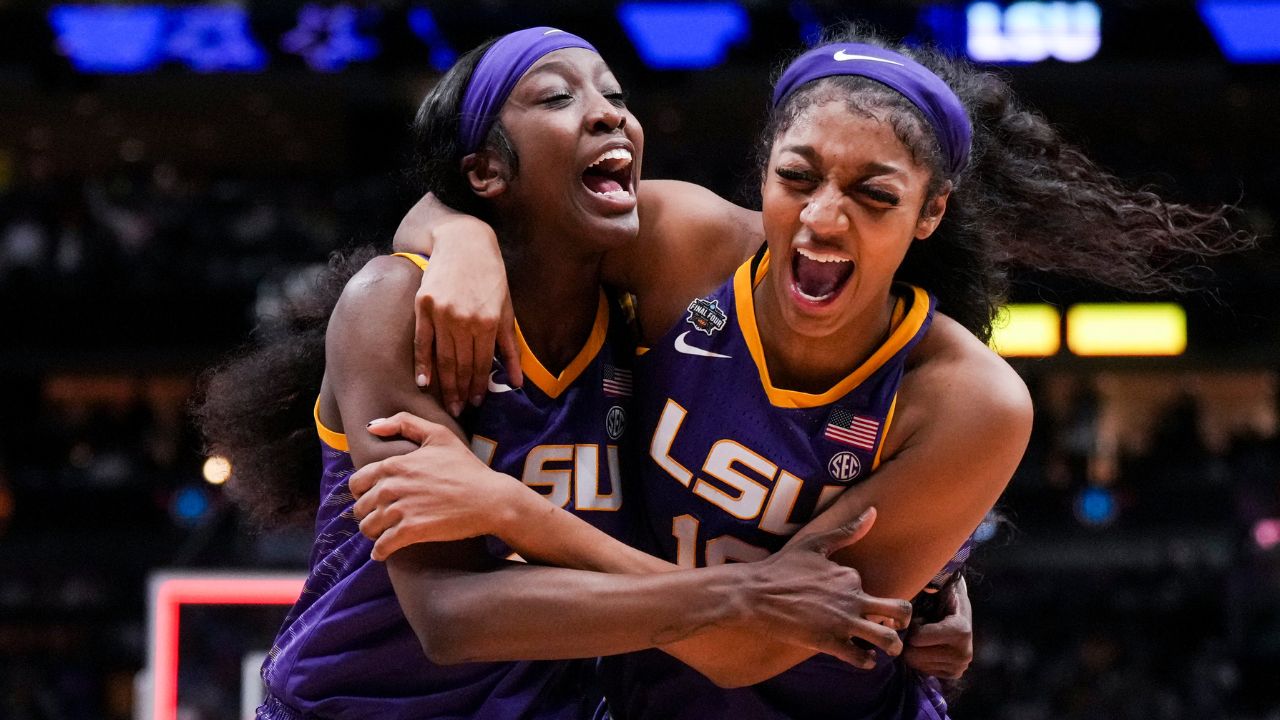 LSU Lady Tigers guard Flau'jae Johnson, left, celebrates with forward Angel Reese after defeating the Virginia Tech Hokies in semifinals of the women's Final Four of the 2023 NCAA Tournament at American Airlines Center. Mandatory Credit: Kirby Lee-Imagn Images