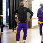 Los Angeles Lakers forward LeBron James (6) stands outside the locker room before the start of game one of the 2023 NBA playoffs against the Golden State Warriors at the Chase Center.
