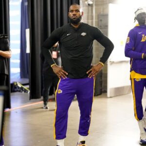 Los Angeles Lakers forward LeBron James (6) stands outside the locker room before the start of game one of the 2023 NBA playoffs against the Golden State Warriors at the Chase Center.