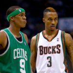 Boston Celtics guard Rajon Rondo (9) stands with Milwaukee Bucks guard Brandon Jennings (3) during the game at the Bradley Center