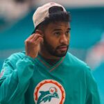Miami Dolphins quarterback Tua Tagovailoa (1) walks on the field before a game against the Buffalo Bills at Hard Rock Stadium.
