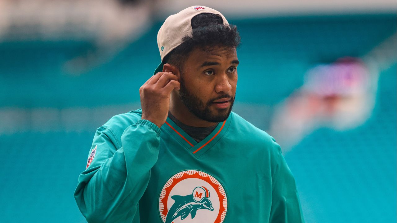 Miami Dolphins quarterback Tua Tagovailoa (1) walks on the field before a game against the Buffalo Bills at Hard Rock Stadium.