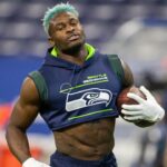 Seattle Seahawks wide receiver DK Metcalf (14) warms up before the game against the Indianapolis Colts at Lucas Oil Stadium.