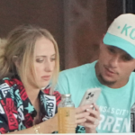 Kansas City Chiefs quarterback Patrick Mahomes and wife Brittany watch play during the first half against the Washington Spirit at CPKC Stadium.