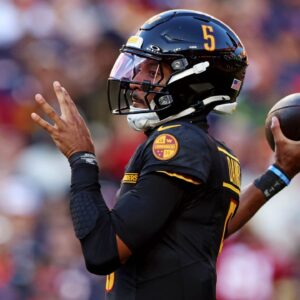Washington Commanders quarterback Jayden Daniels (5) throws a pass during the first quarter against the Chicago Bears at Commanders Field.