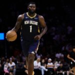 New Orleans Pelicans forward Zion Williamson (1) dribbles the basketball against the Miami Heat during the second quarter at Kaseya Center.