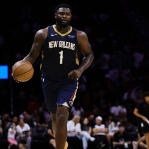 New Orleans Pelicans forward Zion Williamson (1) dribbles the basketball against the Miami Heat during the second quarter at Kaseya Center.