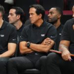 Miami Heat head coach Erik Spoelstra, center, looks on late in the game against the Orlando Magic at the Kaseya Center.