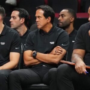 Miami Heat head coach Erik Spoelstra, center, looks on late in the game against the Orlando Magic at the Kaseya Center.