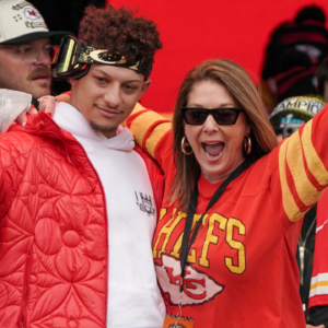 Kansas City Chiefs quarterback Patrick Mahomes (15) celebrates with his mother Randi Martin during the Kansas City Chiefs Super Bowl parade.