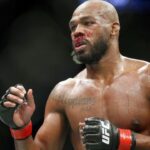 Jon Jones (red gloves) fights Dominick Reyes (not pictured) during UFC 247 at Toyota Center.