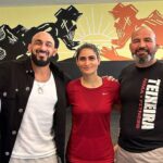 Aline Pereira (third from left)