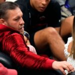 Irish mixed martial artist Conor McGregor looks on during the first half in game four of the 2023 NBA Finals between the Miami Heat and the Denver Nuggets at Kaseya Center.