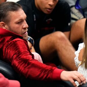 Irish mixed martial artist Conor McGregor looks on during the first half in game four of the 2023 NBA Finals between the Miami Heat and the Denver Nuggets at Kaseya Center.