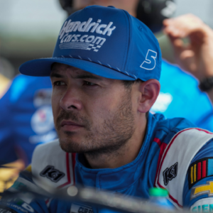 Kyle Larson looks at a screen prior to qualifying at Darlington Raceway.