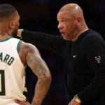 ilwaukee Bucks head coach Doc Rivers talks to guard Damian Lillard (0) during the third quarter of the NBA game against the Los Angeles Lakers at Crypto.com Arena.