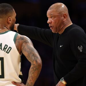 ilwaukee Bucks head coach Doc Rivers talks to guard Damian Lillard (0) during the third quarter of the NBA game against the Los Angeles Lakers at Crypto.com Arena.