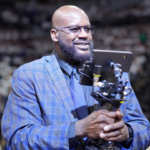Shaquille O'Neal looks on during halftime between the Minnesota Timberwolves and the Dallas Mavericks