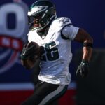 Philadelphia Eagles running back Saquon Barkley (26) carries the ball during the second half against the New York Giants at MetLife Stadium.
