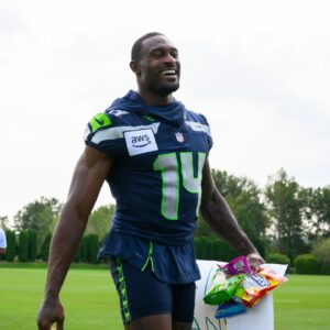 Seattle Seahawks wide receiver DK Metcalf (14) walks off the field after training camp at Virginia Mason Athletic Center.