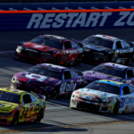 NASCAR Cup Series driver Michael McDowell (34) leads the field during the GEICO 500 at Talladega Superspeedway. Mandatory Credit: Peter Casey-Imagn Images