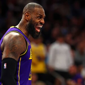 Los Angeles Lakers forward LeBron James (23) reacts to a play during the second half against the Phoenix Suns at Footprint Center.