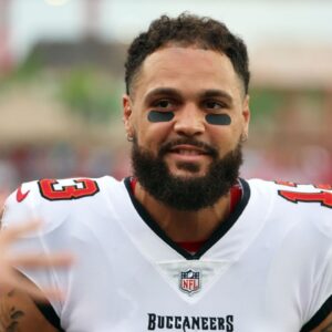 Tampa Bay Buccaneers wide receiver Mike Evans (13) smiles before the game against the Miami Dolphins at Raymond James Stadium.