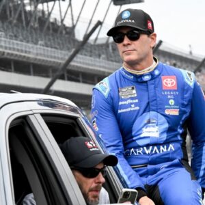 NASCAR Cup Series driver Jimmie Johnson (84) rides around the track during driver introductions ahead of the Brickyard 400, Sunday, July 21, 2024, at Indianapolis Motor Speedway.
