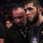 Islam Makhachev (red gloves) celebrates after defeating Alexander Volkanovski (not pictured) for the lightweight championship during UFC 284 at RAC Arena.