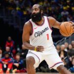 Los Angeles Clippers guard James Harden (1) dribbles the ball during the first half at Climate Pledge Arena
