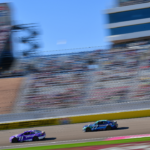NASCAR Cup Series driver Denny Hamlin (11) leads driver Carson Hocevar (77) and driver Josh Berry (4) during the South Point 400 at Las Vegas Motor Speedway.