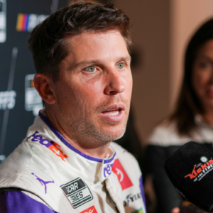 Denny Hamlin speaks to media members during the NASCAR Playoffs Media Day at the Charlotte Convention Center.