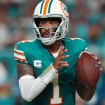 Sep 12, 2024; Miami Gardens, Florida, USA; Miami Dolphins quarterback Tua Tagovailoa (1) drops back with the ball against the Buffalo Bills during the first half at Hard Rock Stadium.