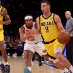 Oct 25, 2024; New York, New York, USA; Indiana Pacers guard T.J. McConnell (9) drives to the basket against New York Knicks guard Miles McBride (2) during the second quarter at Madison Square Garden. Mandatory Credit: Brad Penner-Imagn Images