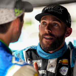 Ross Chastain (1) talks to Daniel Suarez (99) ahead of qualifying for the Sunday NASCAR EchoPark Automotive Grand Prix at the Circuit of the Americas on Saturday, March 23, 2024 in Austin.