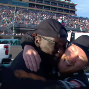 Michael Jordan hugging Tyler Reddick after winning the Homestead Miami Race.