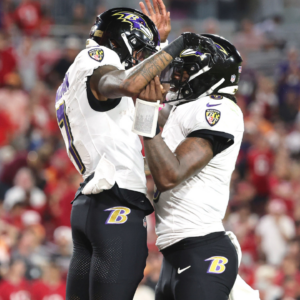 Oct 21, 2024; Tampa, Florida, USA; Baltimore Ravens wide receiver Rashod Bateman (7) is congratulated by quarterback Lamar Jackson (8) after he scored a touchdown against the Tampa Bay Buccaneers during the second half at Raymond James Stadium.