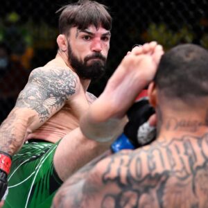 Mike Perry kicks Daniel Rodriguez in a welterweight fight during the UFC Fight Night event at UFC APEX on April 10, 2021 in Las Vegas, Nevada.