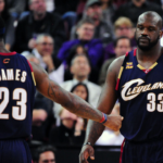 Cleveland Cavaliers center Shaquille O'Neal (33) receives a hand shake from forward LeBron James (23) after receiving his third foul during the second quarter against the Sacramento Kings at Arco Arena.