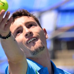 Ugo Humbert (FRA) serves against Arthur Fils (FRA) in first round play at IGA Stadium.