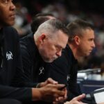 Denver Nugget head coach Michael Malone on the bench in the second half against the Oklahoma City Thunder at Ball Arena