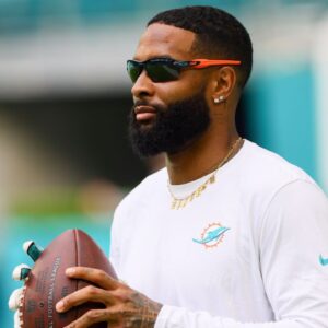 Miami Dolphins wide receiver Odell Beckham Jr. (3) throws the football before preseason game against the Washington Commanders at Hard Rock Stadium.